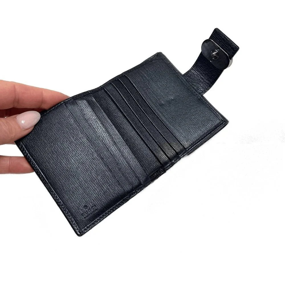 Auc Gucci Snappy Bi-fold GG vintage leather wallet